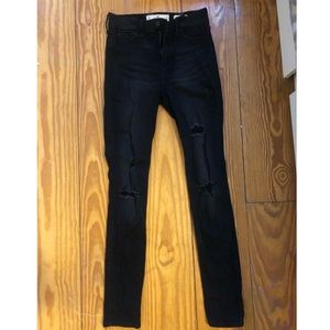 Ripped black skinny jeans